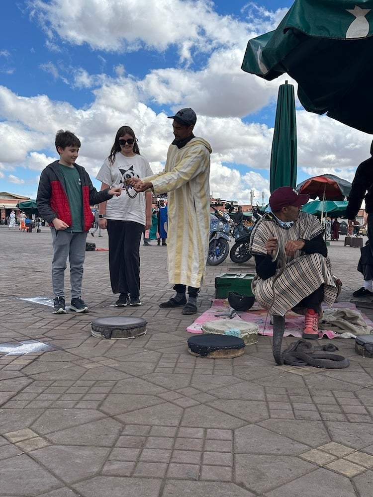 Seb and Clara with the Snake Charmer